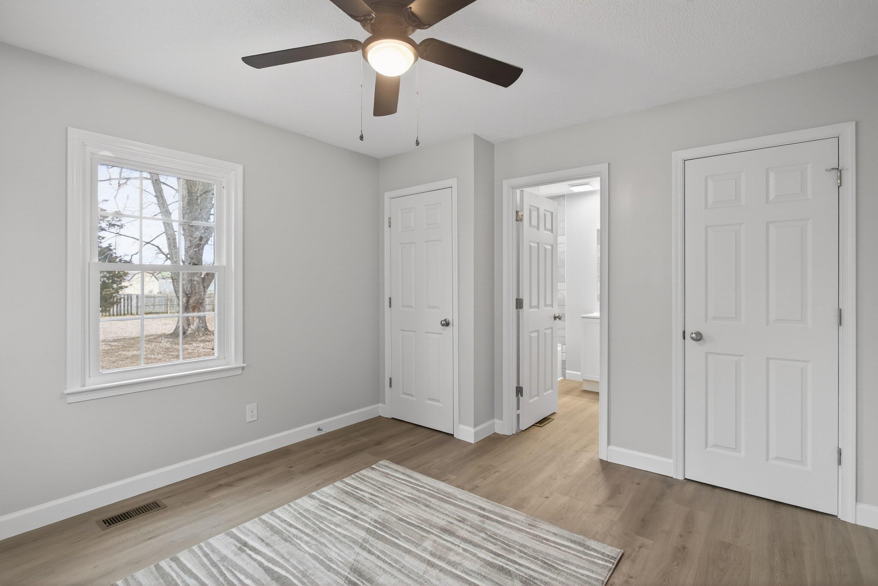 178 Suter Street Harrisonburg, VA 22802 - Photo 25 of 73 a view of an empty room with wooden floor and a window