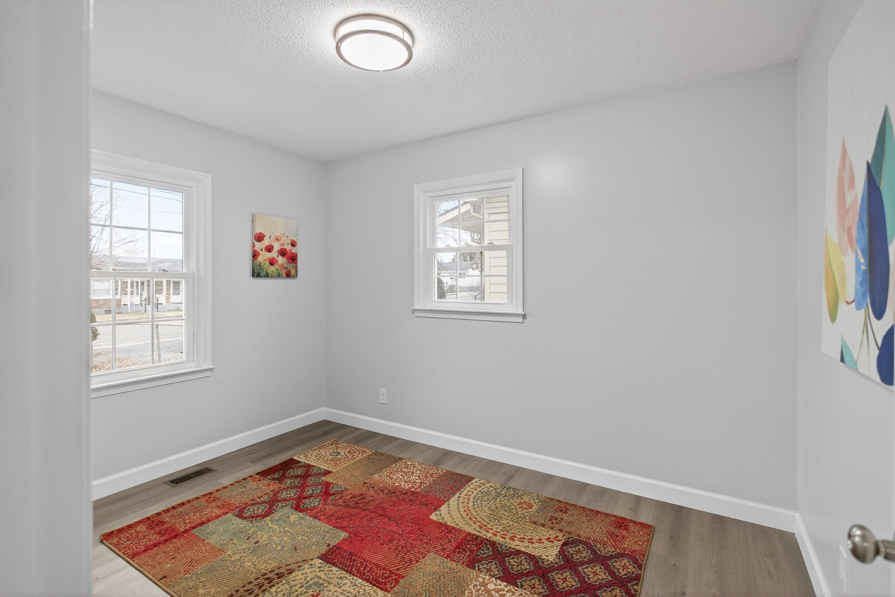 178 Suter Street Harrisonburg, VA 22802 - Photo 33 of 73 This second bedroom offers fresh paint, large windows, luxury vinyl plank flooring, and spacious closet space!