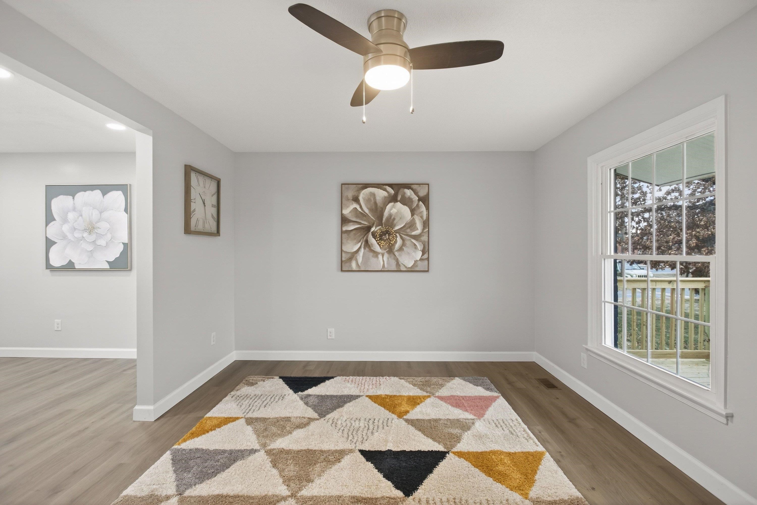 178 Suter Street Harrisonburg, VA 22802 - Photo 4 of 73 a view of a big room with wooden floor and windows