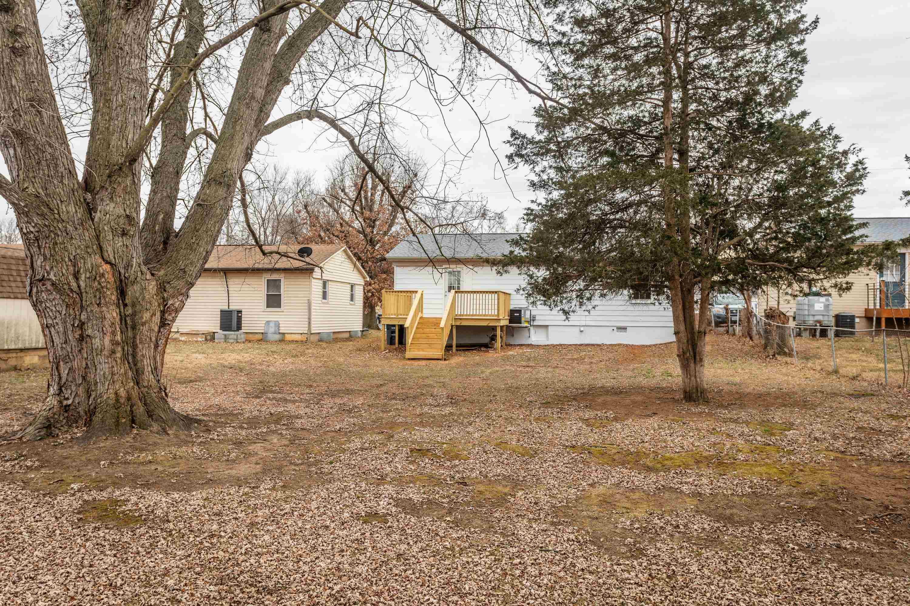 178 Suter Street Harrisonburg, VA 22802 - Photo 48 of 73 a white house that has a tree in front of it