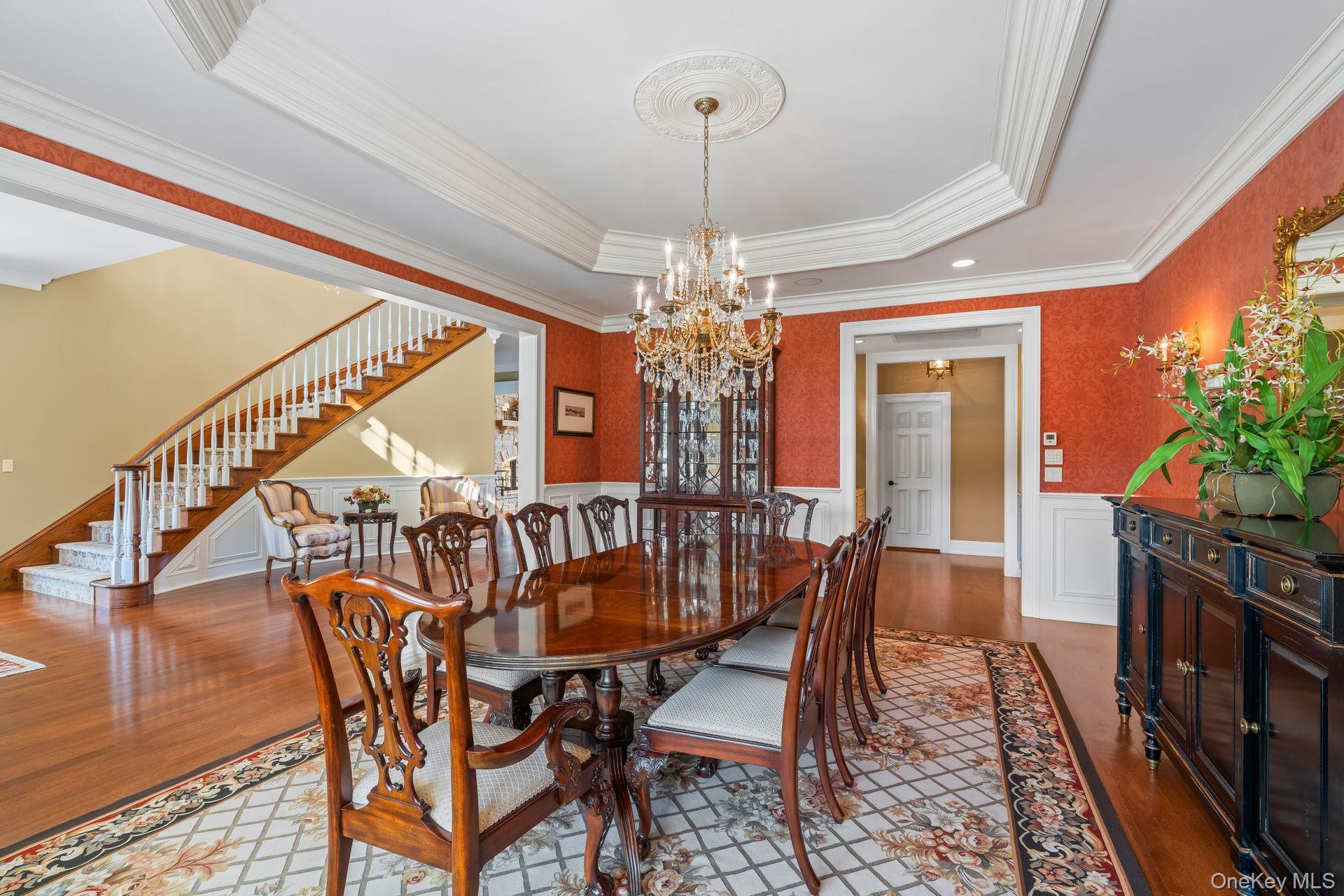 697 Short Beach Road Nissequogue, NY 11780 - Photo 12 of 46 a view of a dining room with furniture window and wooden floor