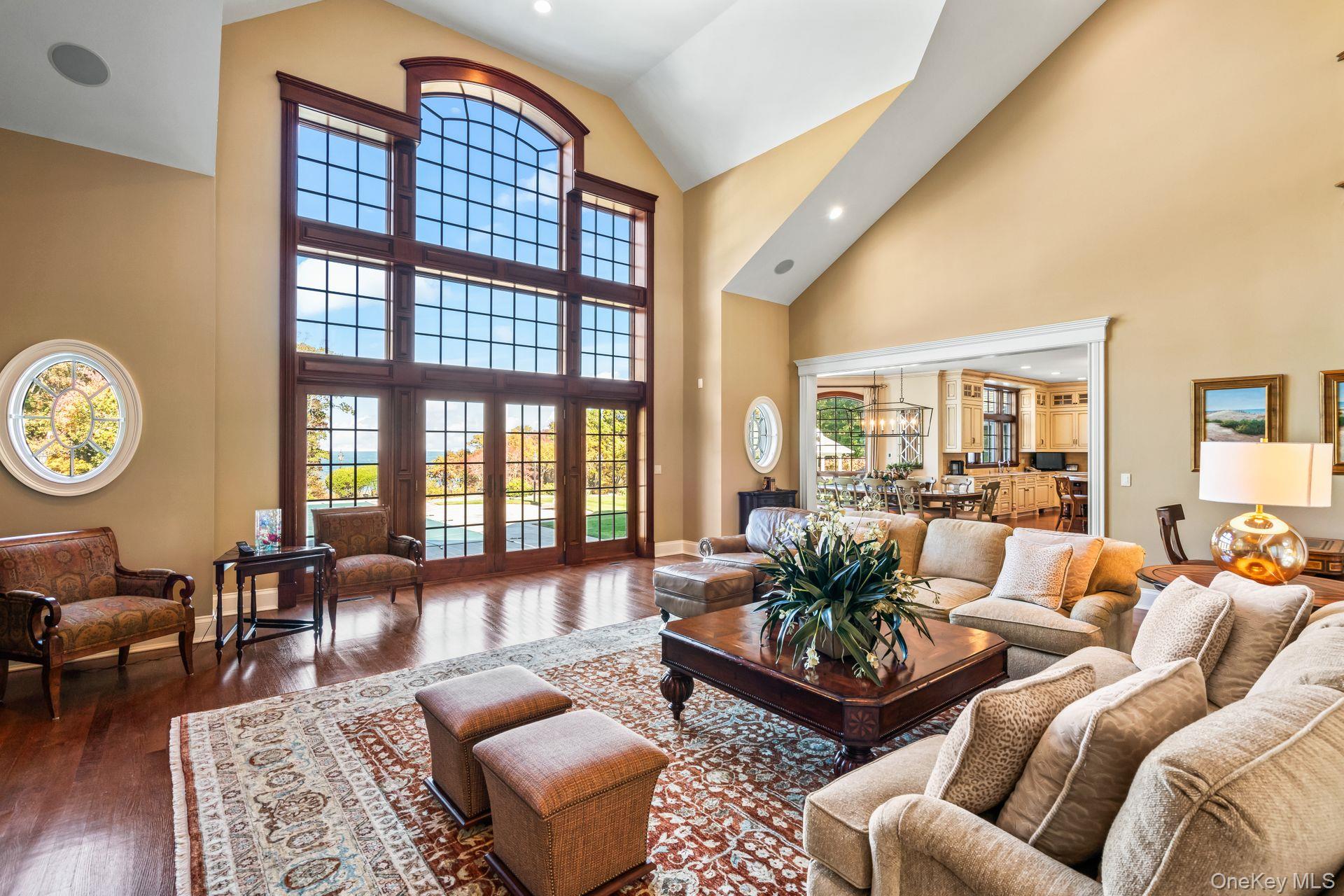 697 Short Beach Road Nissequogue, NY 11780 - Photo 14 of 46 a living room with furniture and a large window