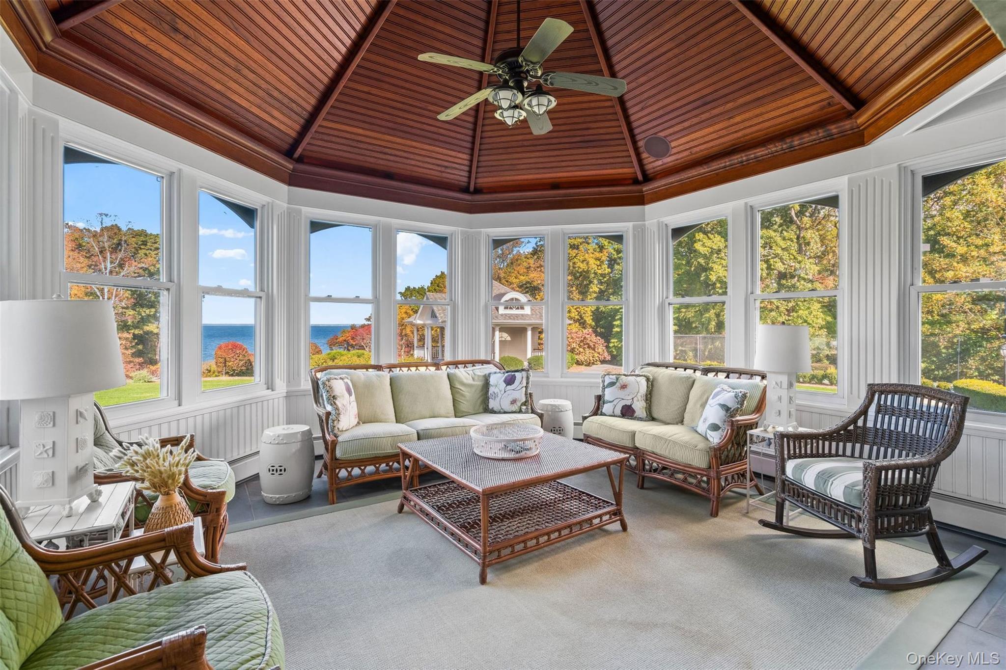 697 Short Beach Road Nissequogue, NY 11780 - Photo 21 of 46 a living room with furniture and a large window