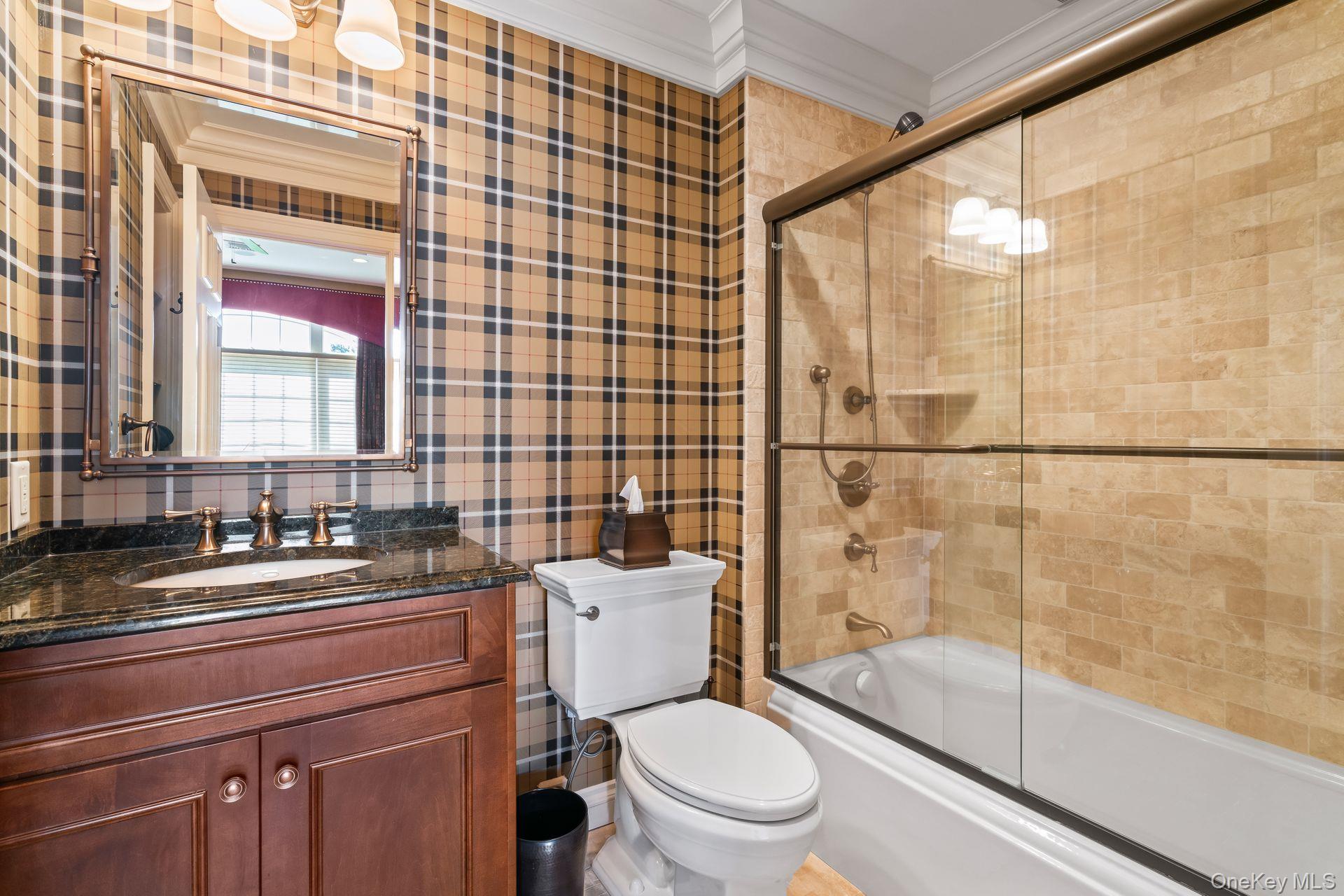 697 Short Beach Road Nissequogue, NY 11780 - Photo 30 of 46 a bathroom with a sink a toilet and shower