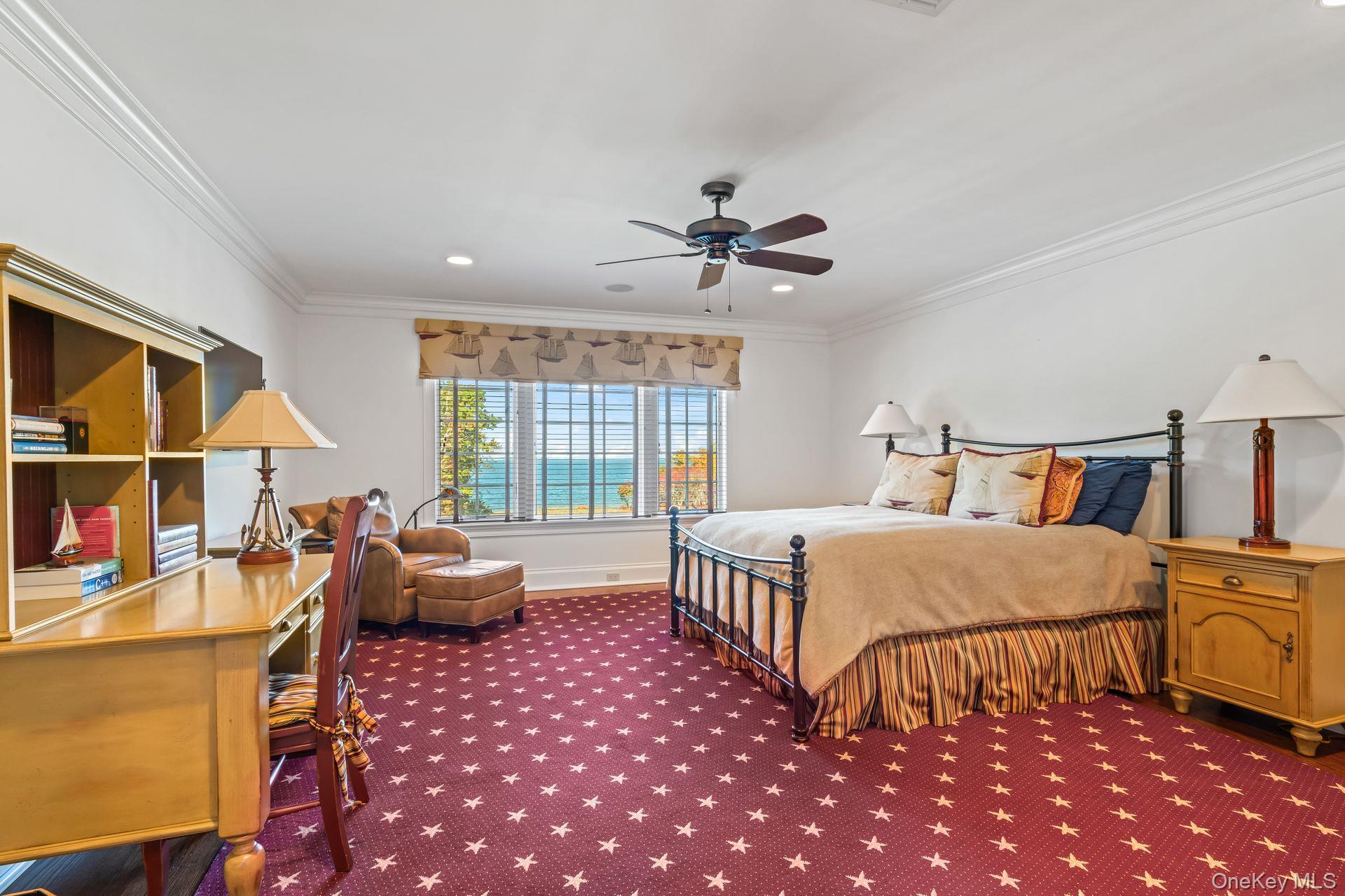 697 Short Beach Road Nissequogue, NY 11780 - Photo 35 of 46 a bedroom with furniture and a window