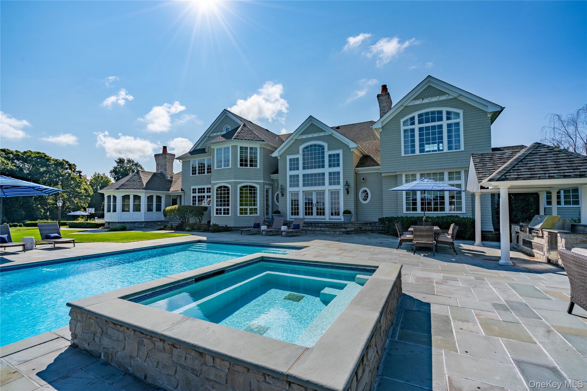 697 Short Beach Road Nissequogue, NY 11780 - Photo 38 of 46 a view of an house with swimming pool and porch