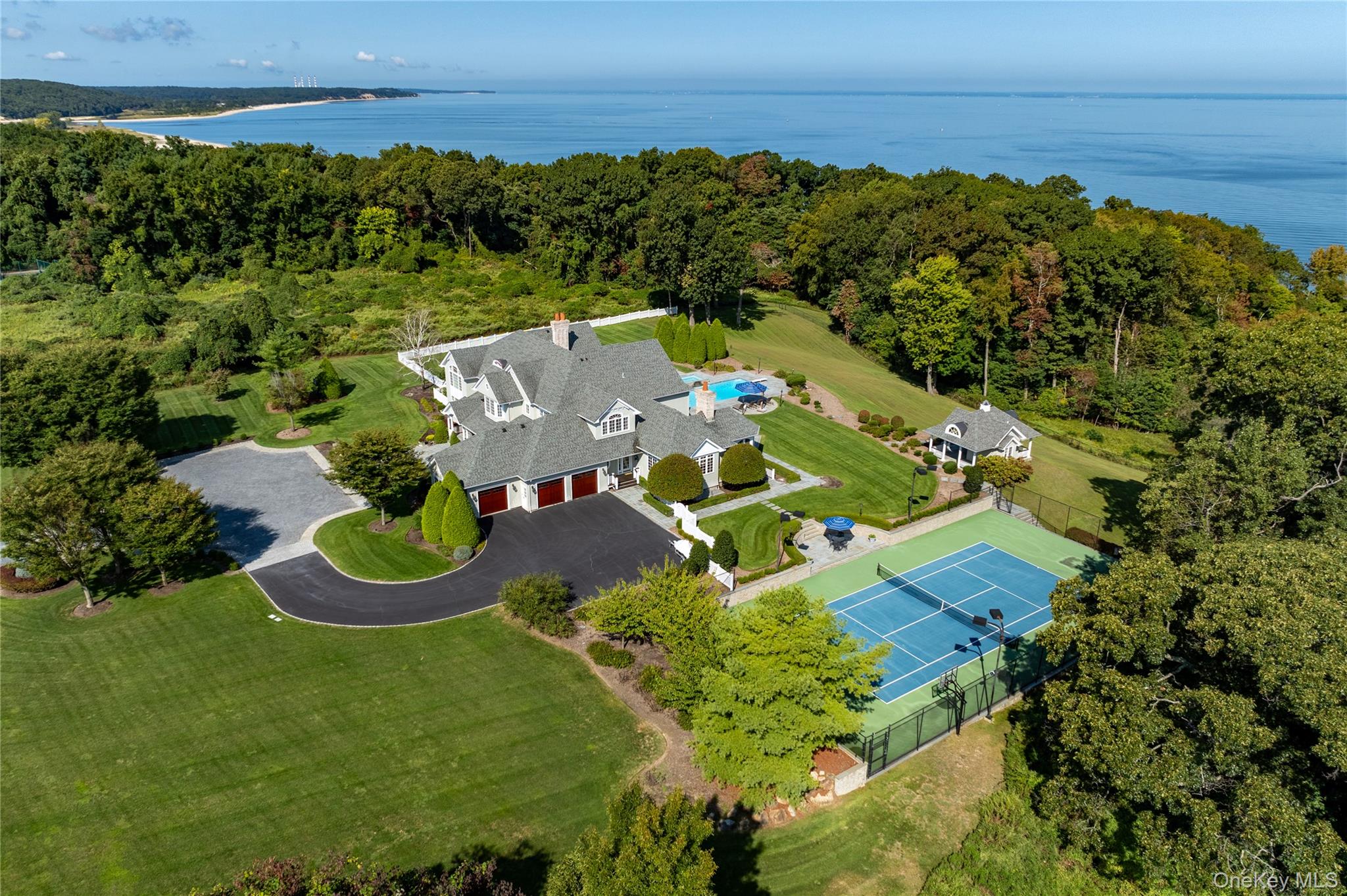 697 Short Beach Road Nissequogue, NY 11780 - Photo 45 of 46 an aerial view of a house with a garden