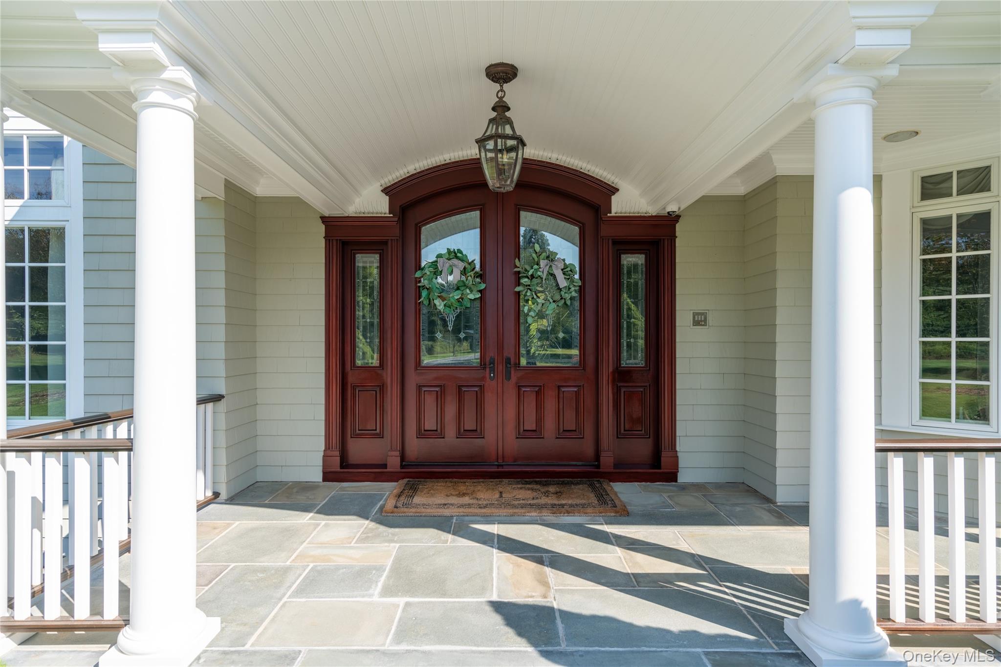 697 Short Beach Road Nissequogue, NY 11780 - Photo 9 of 46 a view of a entryway door of the house