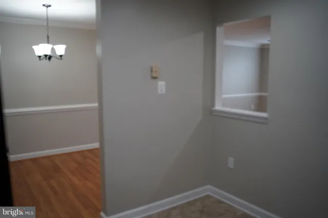 a view of a small space with racks on the wall