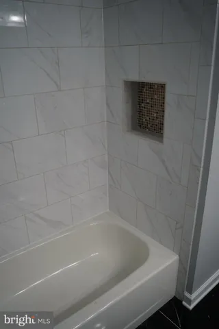a bathroom with a bathtub