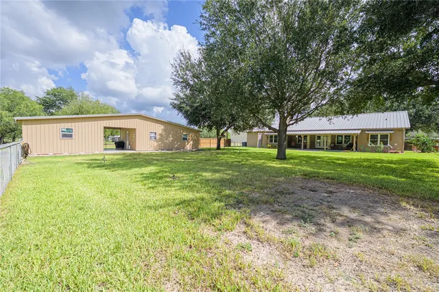 a house view with a garden space