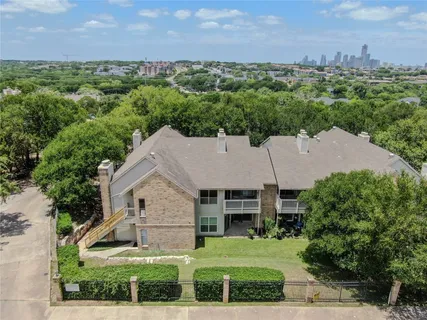 an aerial view of a wooden house