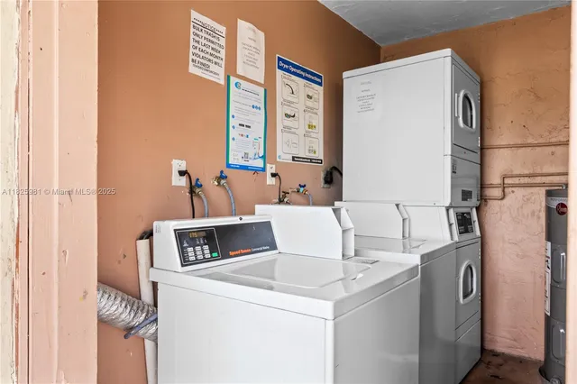 a utility room with dryer and washer