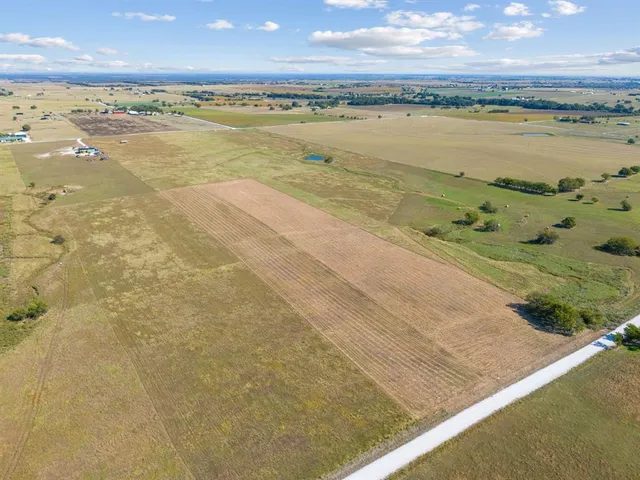 a view of an ocean and city