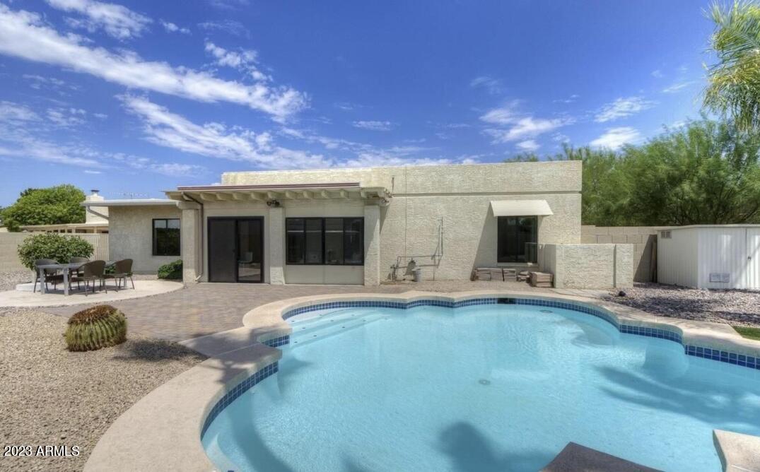 6609 East Phelps Road Scottsdale, AZ 85254 - Photo 68 of 83 a view of a house with backyard and sitting area