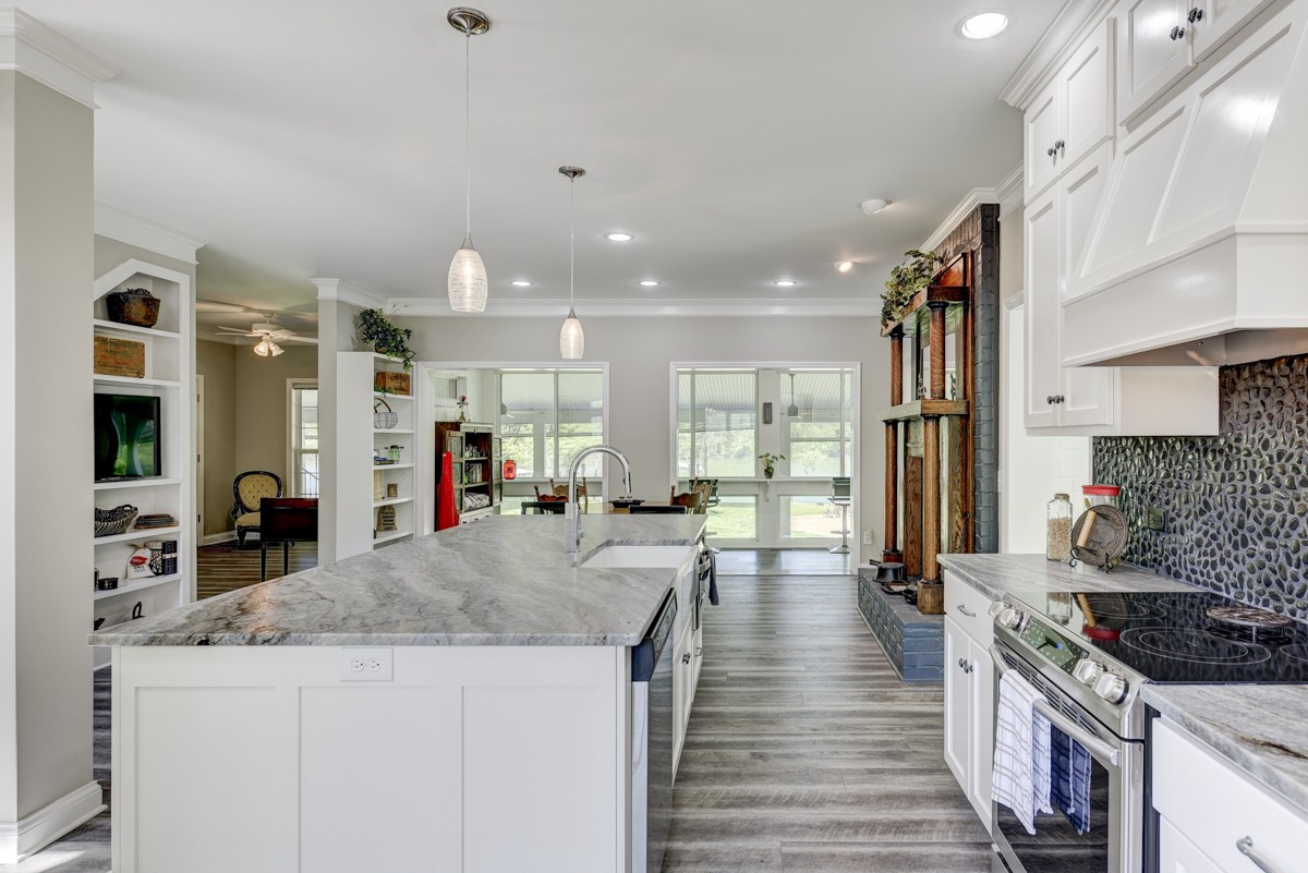 450 North Denny Road Lebanon, TN 37087 - Photo 13 of 65 a kitchen with stainless steel appliances granite countertop a sink stove and refrigerator
