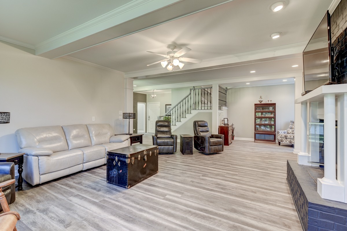 450 North Denny Road Lebanon, TN 37087 - Photo 23 of 65 a living room with furniture a flat screen tv and a fireplace
