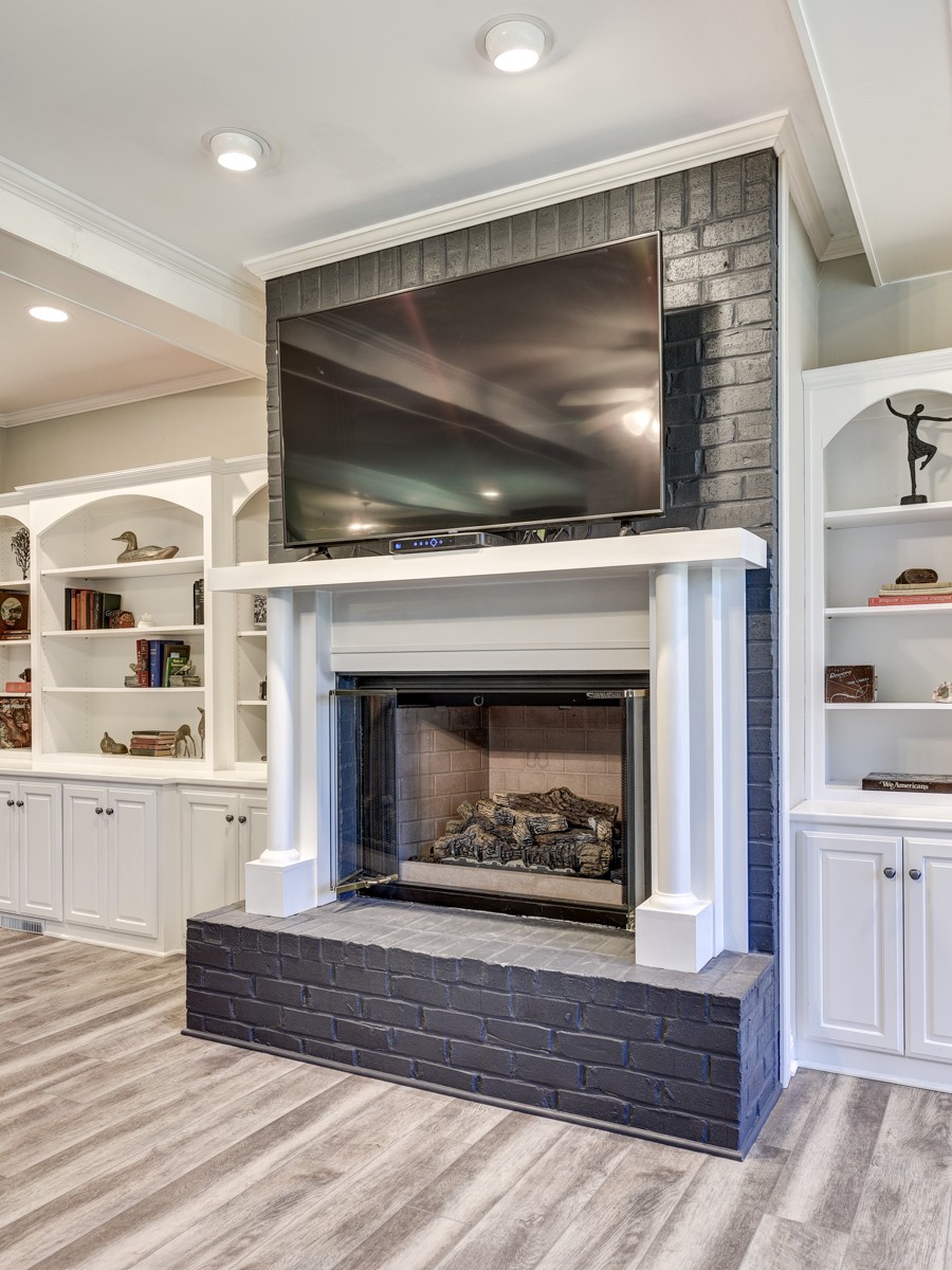 450 North Denny Road Lebanon, TN 37087 - Photo 24 of 65 a living room with a fireplace and a flat screen tv
