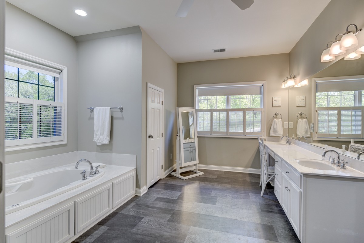 450 North Denny Road Lebanon, TN 37087 - Photo 36 of 65 a bathroom with a tub sink and mirror