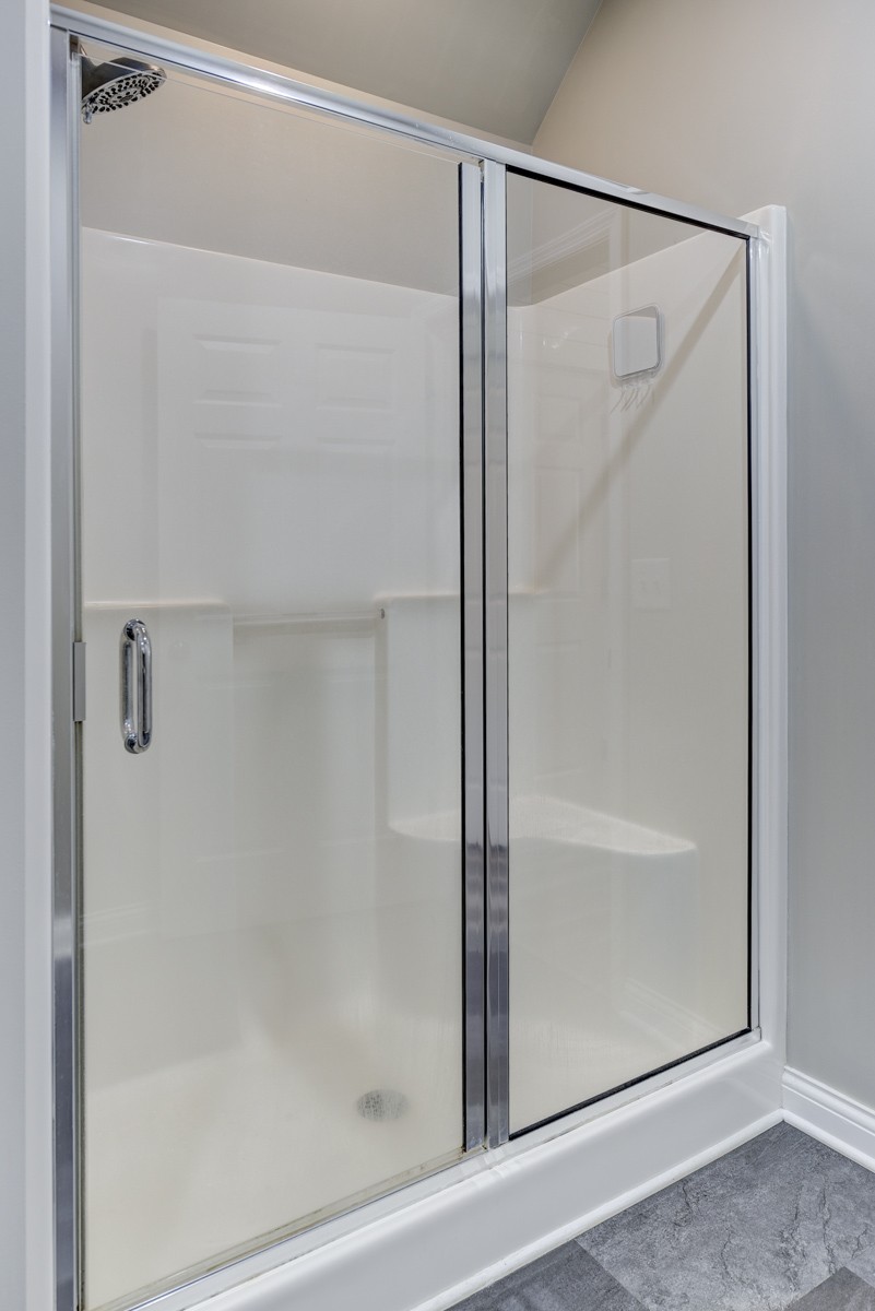 450 North Denny Road Lebanon, TN 37087 - Photo 39 of 65 a bathroom with a glass shower door