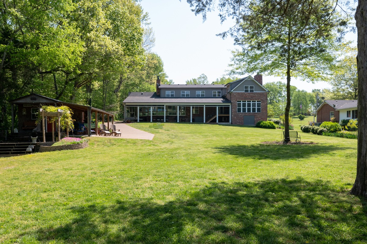 450 North Denny Road Lebanon, TN 37087 - Photo 50 of 65 a view of a house with a swimming pool and a yard