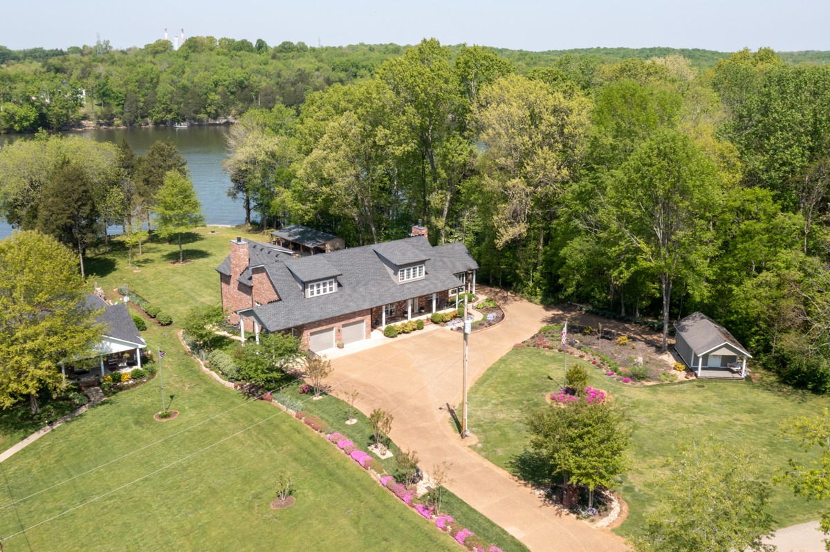 450 North Denny Road Lebanon, TN 37087 - Photo 62 of 65 an aerial view of a house with a garden and lake view