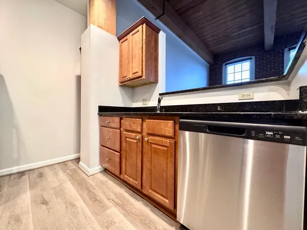 a view of a refrigerator and window