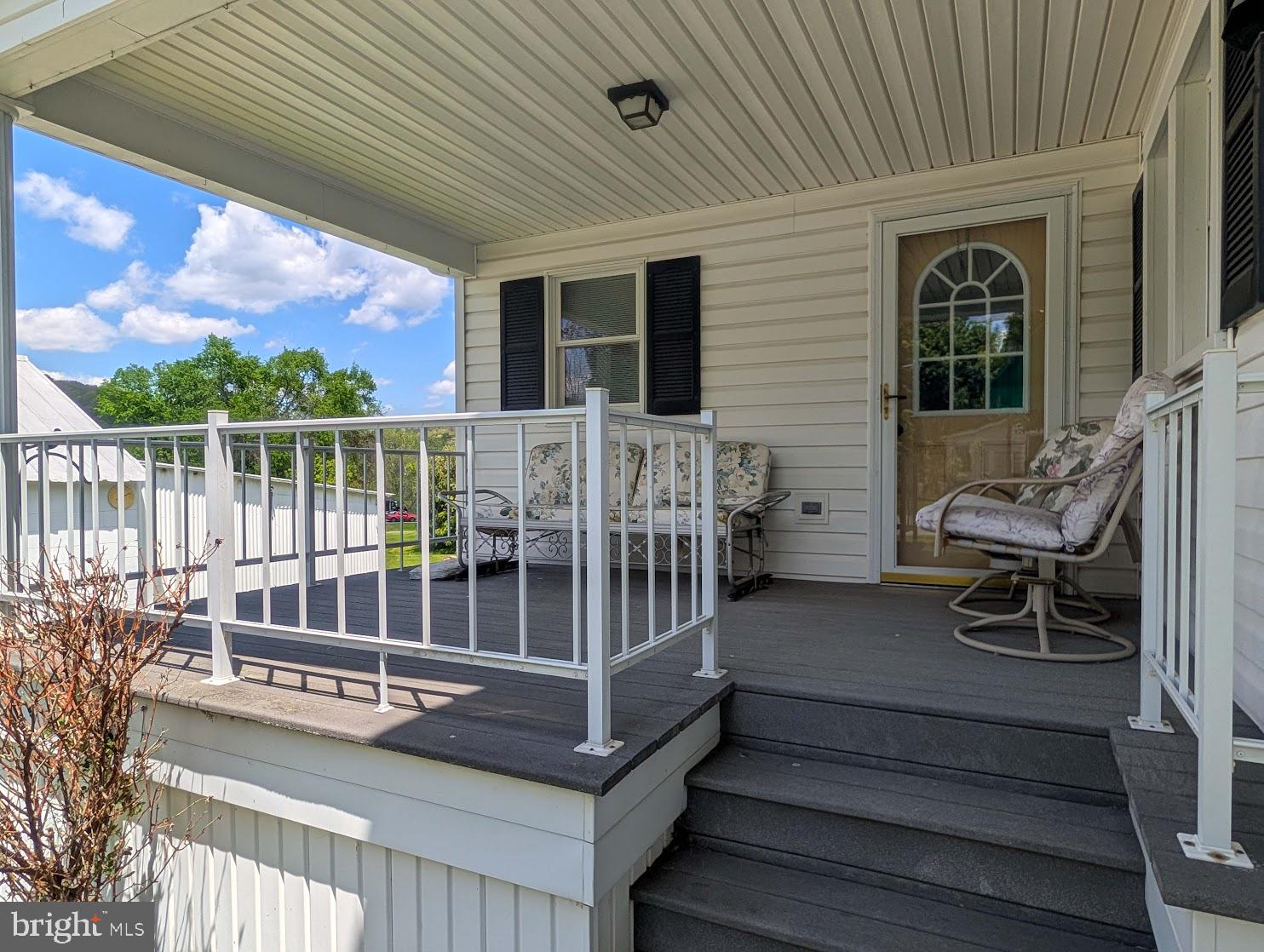 601 16th Street Saxton, PA 16678 - Photo 2 of 57 a view of a chair and tables in the balcony