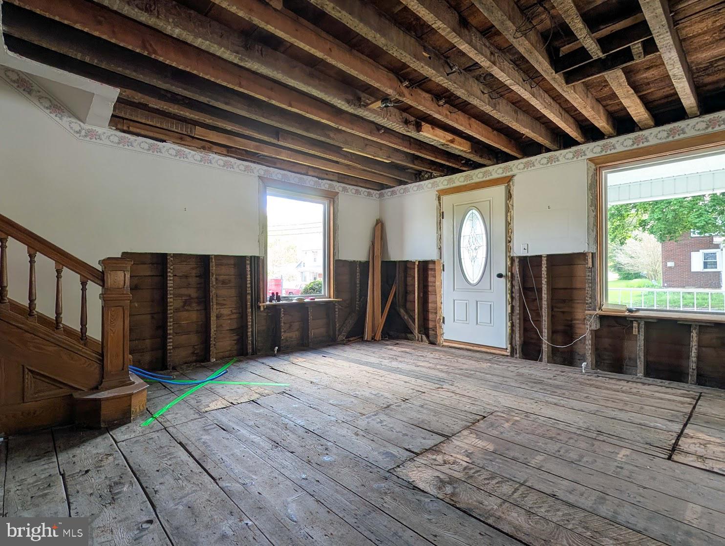 601 16th Street Saxton, PA 16678 - Photo 23 of 57 a view of an empty room with wooden floor and a window