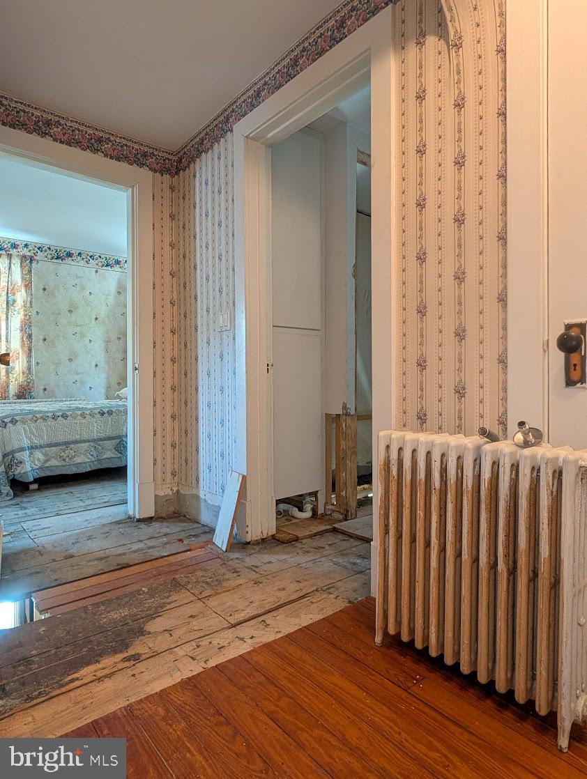 601 16th Street Saxton, PA 16678 - Photo 26 of 57 a view of a bedroom with wooden floor and a window