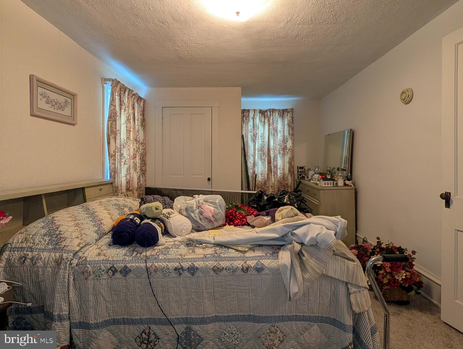 601 16th Street Saxton, PA 16678 - Photo 27 of 57 a bedroom with bed and a window