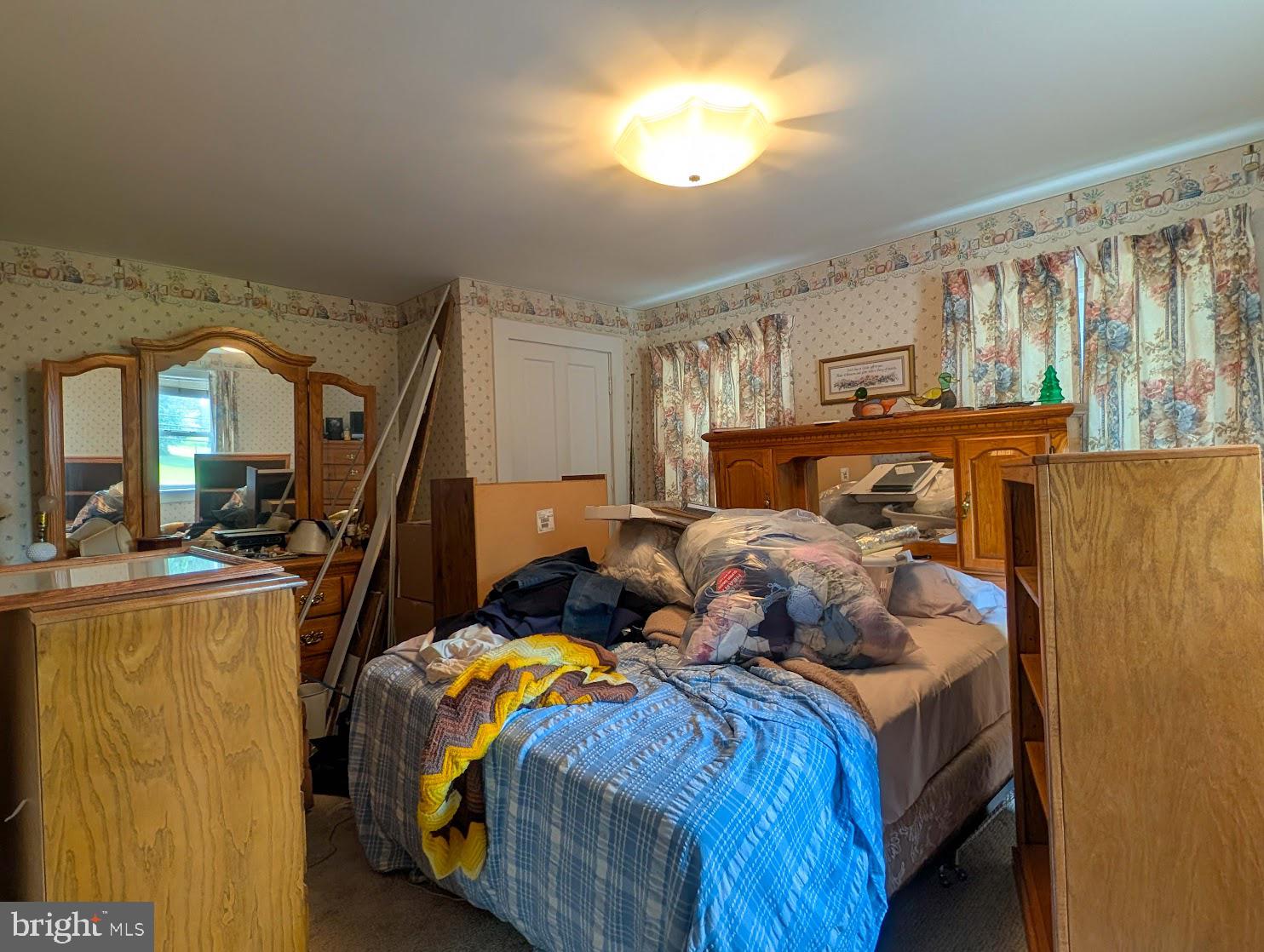 601 16th Street Saxton, PA 16678 - Photo 28 of 57 a bedroom with bed and window