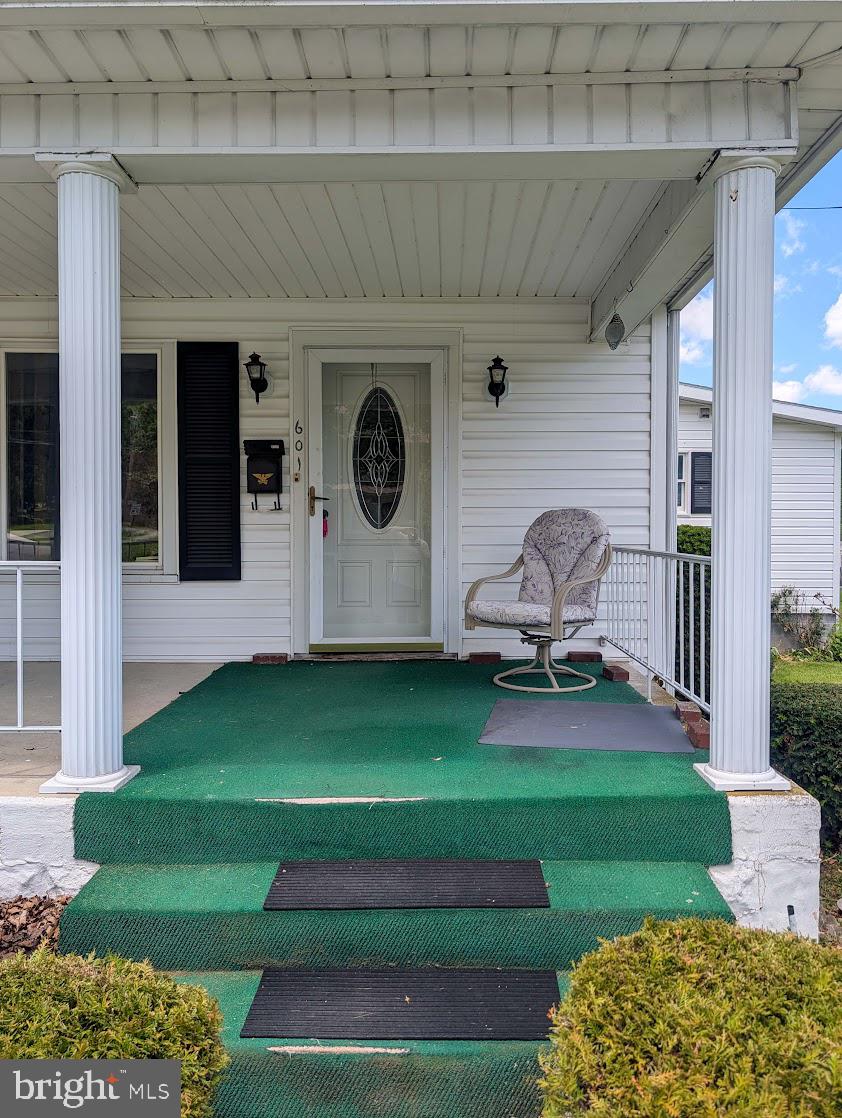 601 16th Street Saxton, PA 16678 - Photo 33 of 57 a backyard of a house with table and chairs