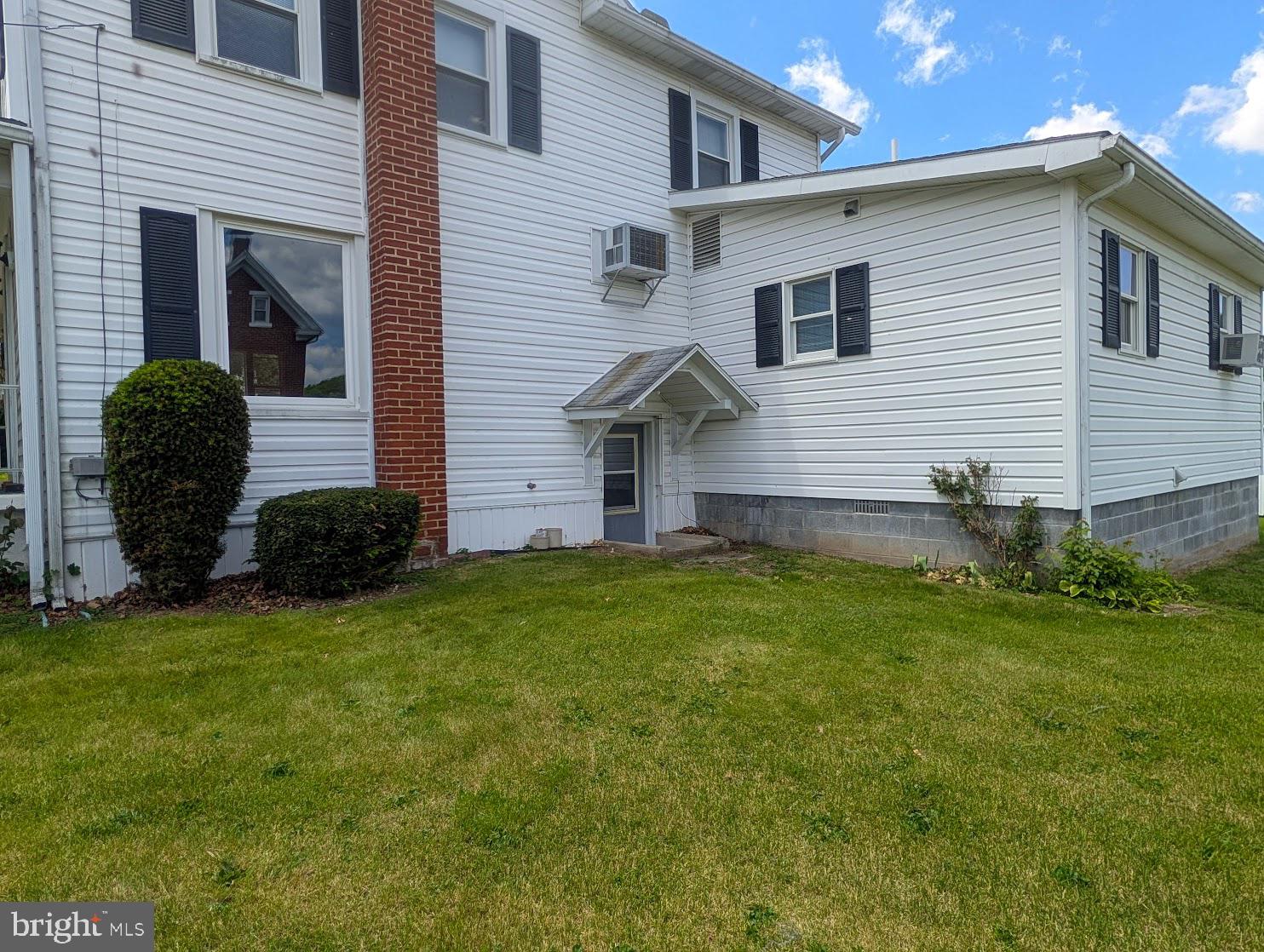 601 16th Street Saxton, PA 16678 - Photo 35 of 57 a view of a house with a backyard