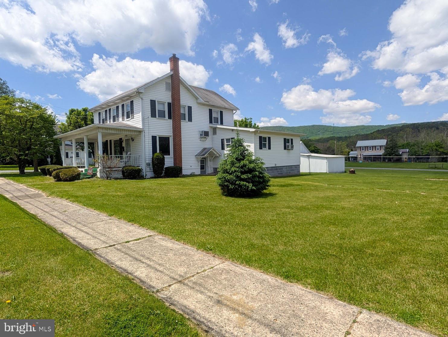 601 16th Street Saxton, PA 16678 - Photo 37 of 57 a front view of a house with garden