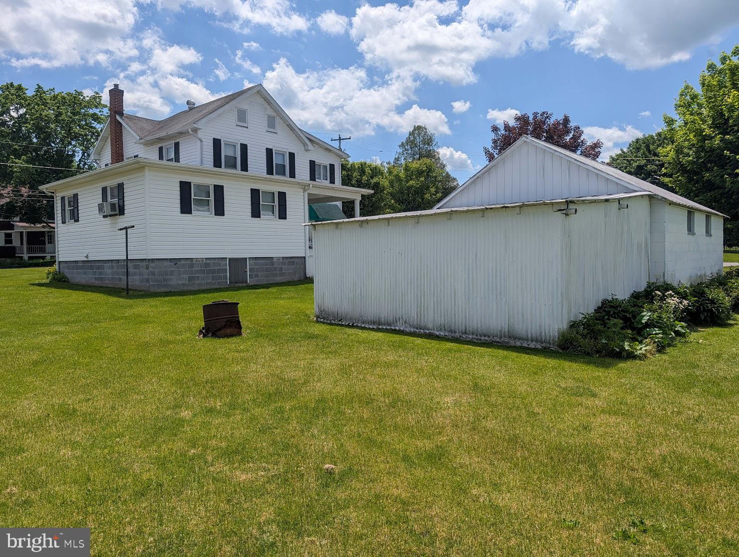 601 16th Street Saxton, PA 16678 - Photo 39 of 57 a view of a house with garden and a yard