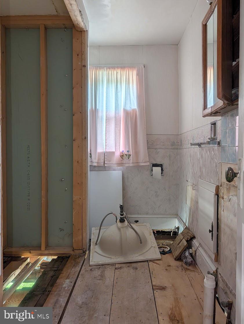 601 16th Street Saxton, PA 16678 - Photo 48 of 57 a bathroom with a sink and a window