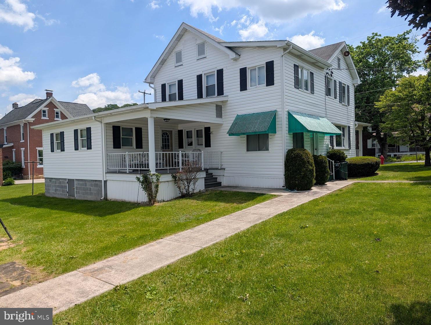 601 16th Street Saxton, PA 16678 - Photo 50 of 57 a front view of a house with a garden