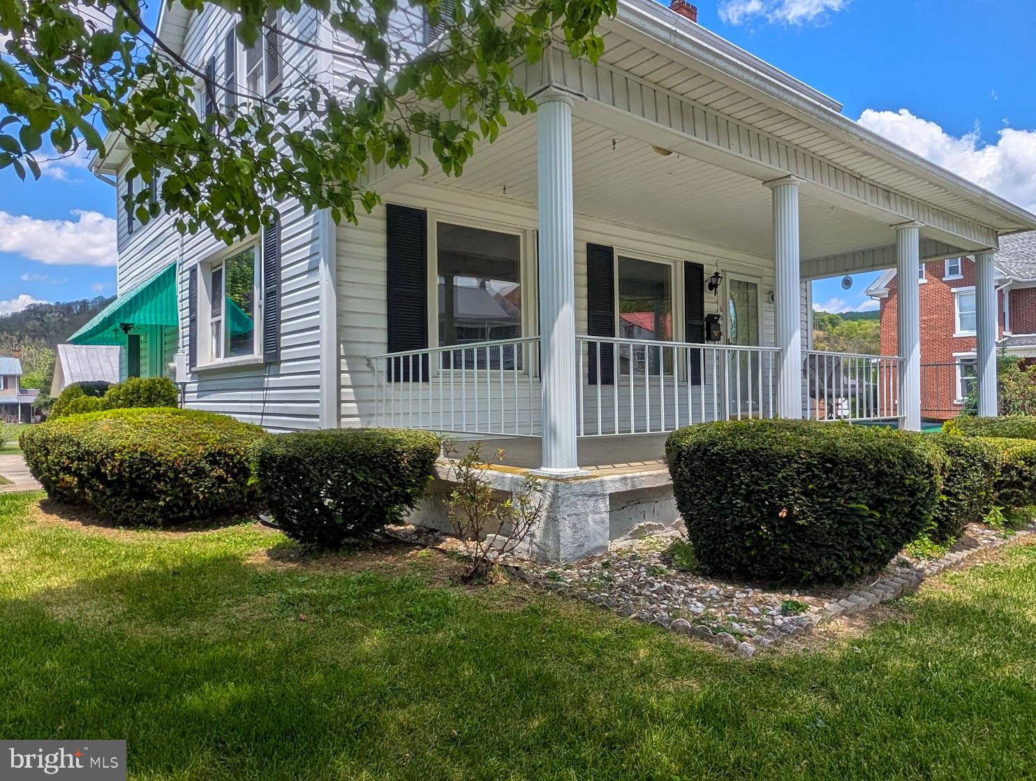 601 16th Street Saxton, PA 16678 - Photo 5 of 57 a front view of a house with a garden