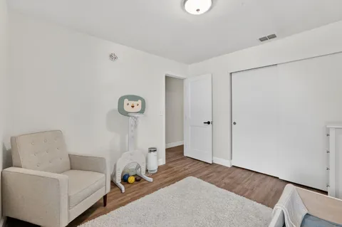 a room with bed and a couch