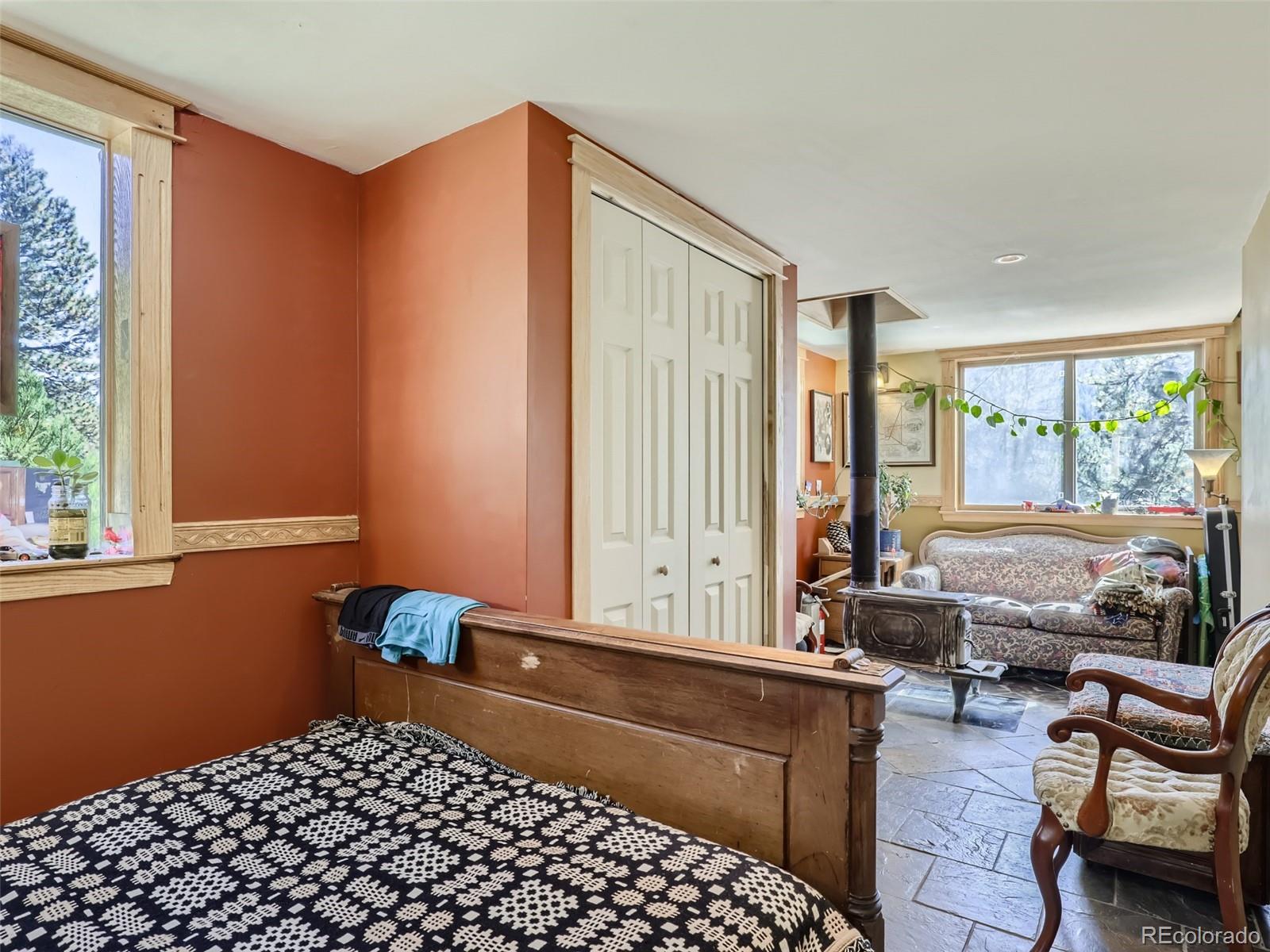 33657 Valley View Drive Evergreen, CO 80439 - Photo 8 of 13 a living room with furniture and a window