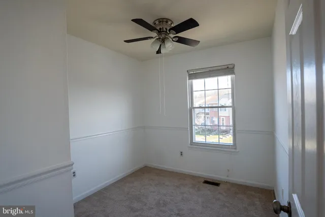 a view of a hallway with closet