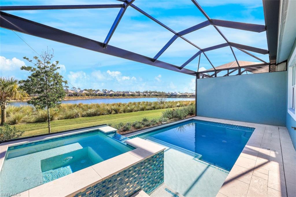 6295 Arriba Avenue Naples, FL 34113 - Photo 2 of 34 a view of outdoor space with seating area