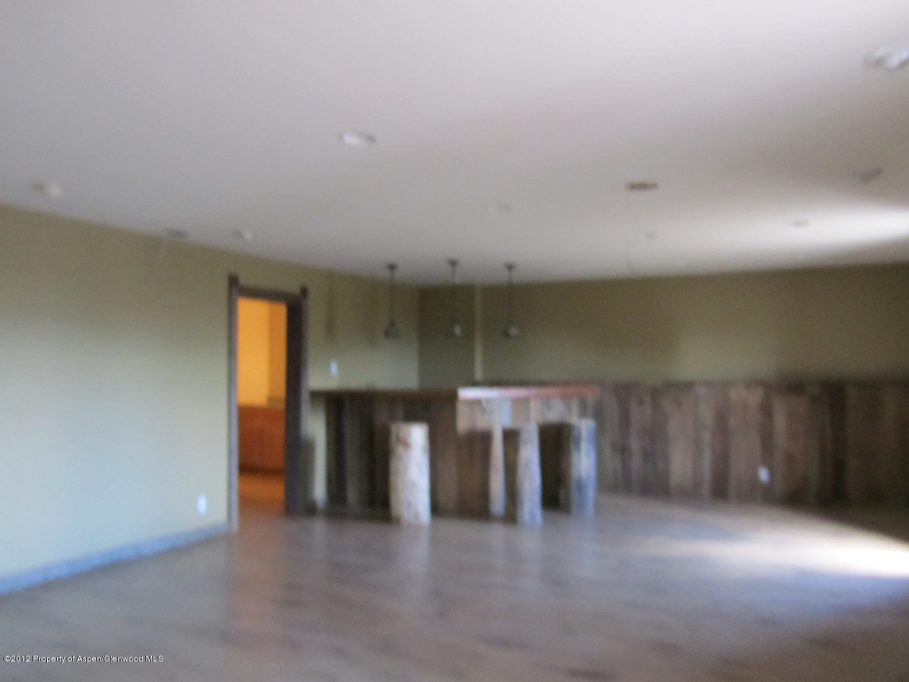 1101 County Road 227 Rifle, CO 81650 - Photo 8 of 9 a view of an empty room with a fireplace