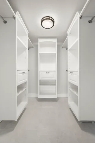 a view of an empty walk in closet