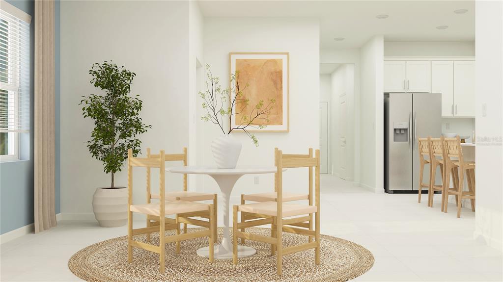 4246 St Thomas Way Kissimmee, FL 34758 - Photo 4 of 30 a view of a dining room with furniture