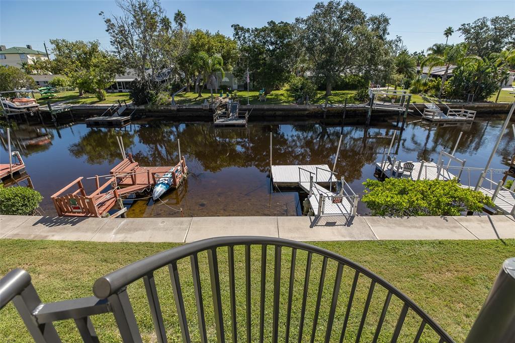 8210 Aquila Street, Unit 213 Port Richey, FL 34668 - Photo 38 of 48 swimming pool view with a lake view