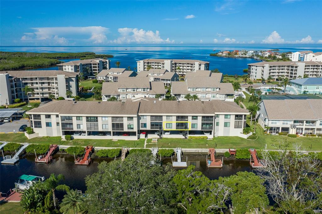 8210 Aquila Street, Unit 213 Port Richey, FL 34668 - Photo 47 of 48 an aerial view of a house with a garden view