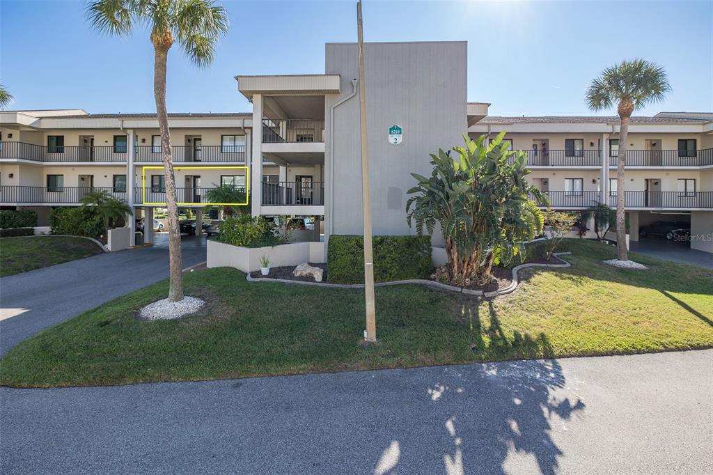 8210 Aquila Street, Unit 213 Port Richey, FL 34668 - Photo 48 of 48 a view of a house with backyard porch and sitting area
