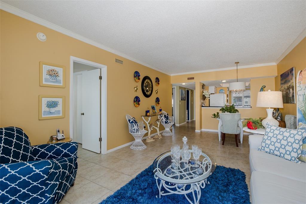 8210 Aquila Street, Unit 213 Port Richey, FL 34668 - Photo 10 of 48 a living room with furniture and wooden floor
